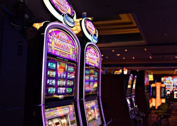 Filipino player browsing slot game titles on a mobile phone via 100 bet